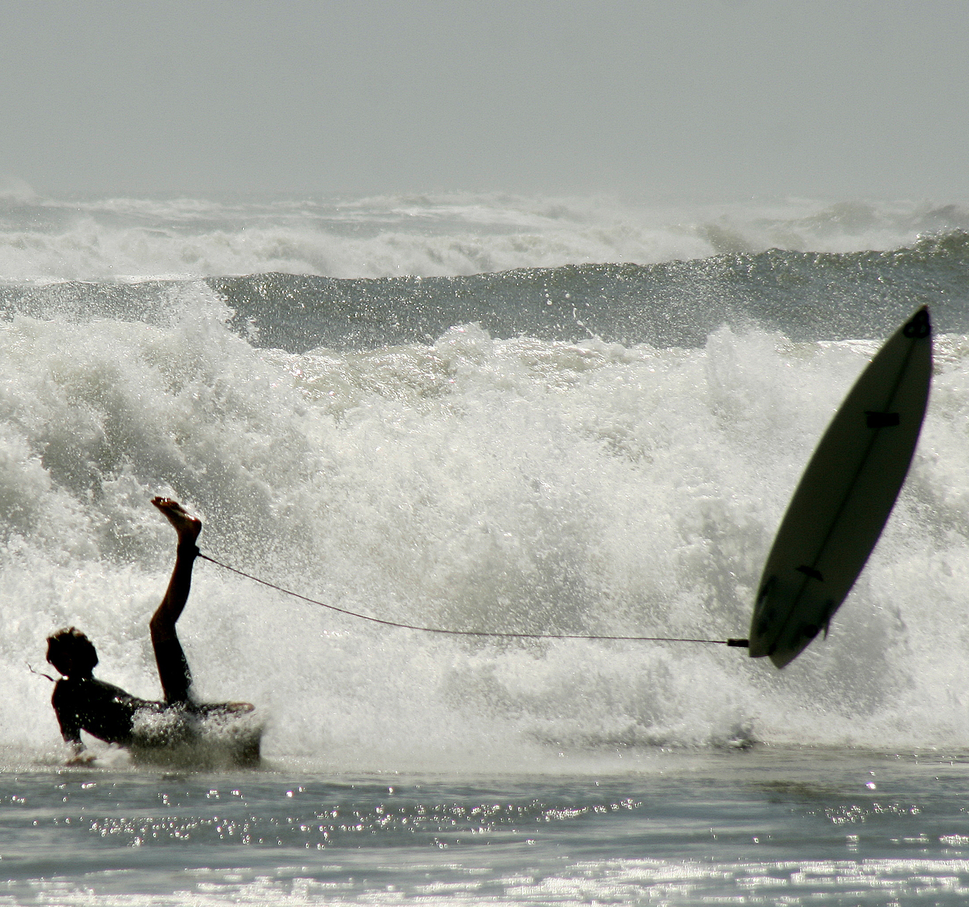 surfer wipes out