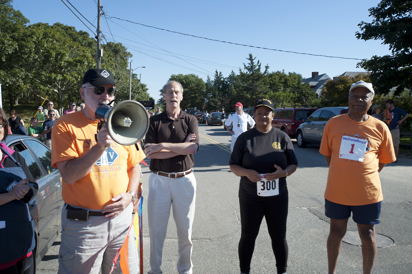 man with megaphone starts the race