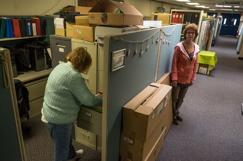 Need for office space has overflowed into the hall.