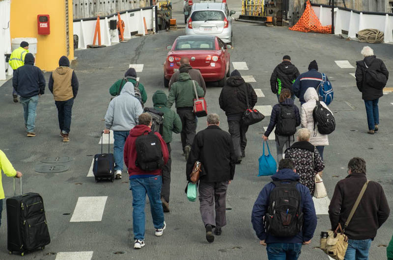 Woods Hole at last. Passengers leave freight boat Sankaty.