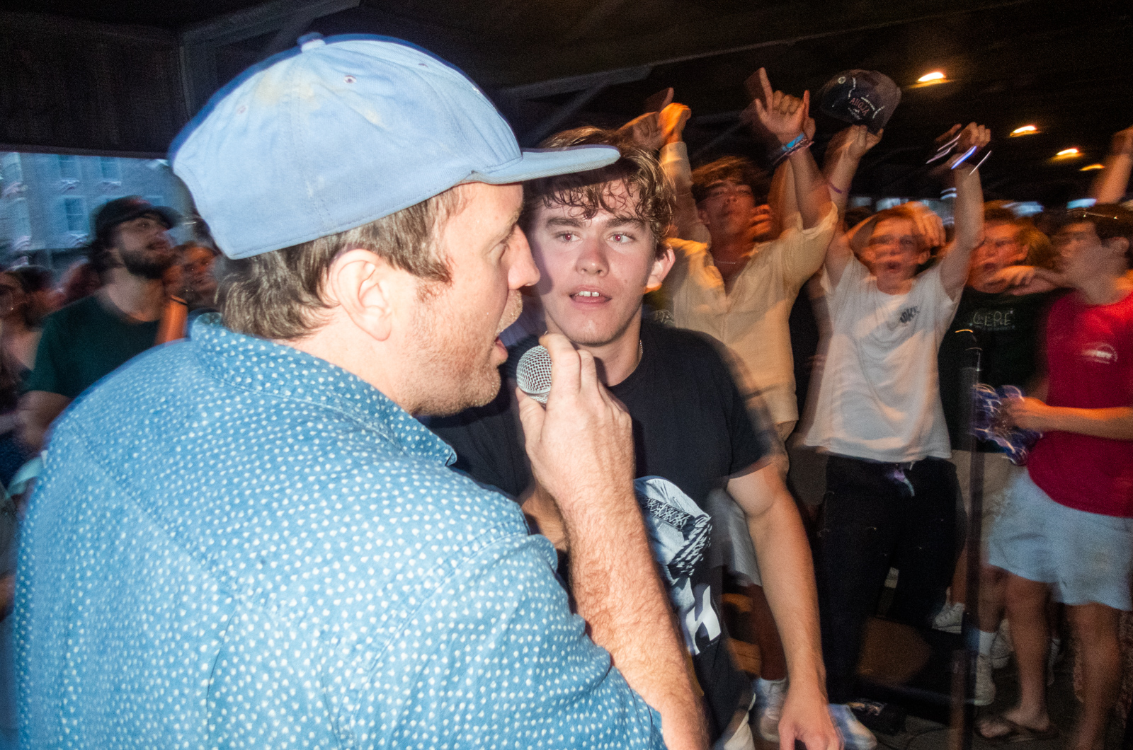 Adam Petkus hands the mic to Atlas Zack whose band "Dem Boys" are given a guest spot.