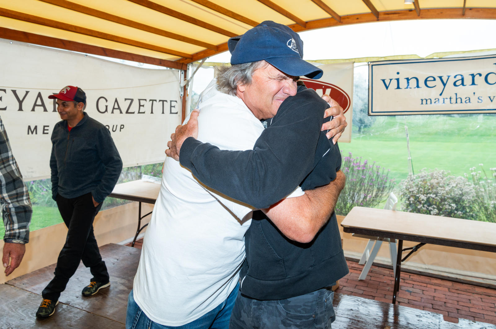 Teammates Bill Potter and David Kadison.