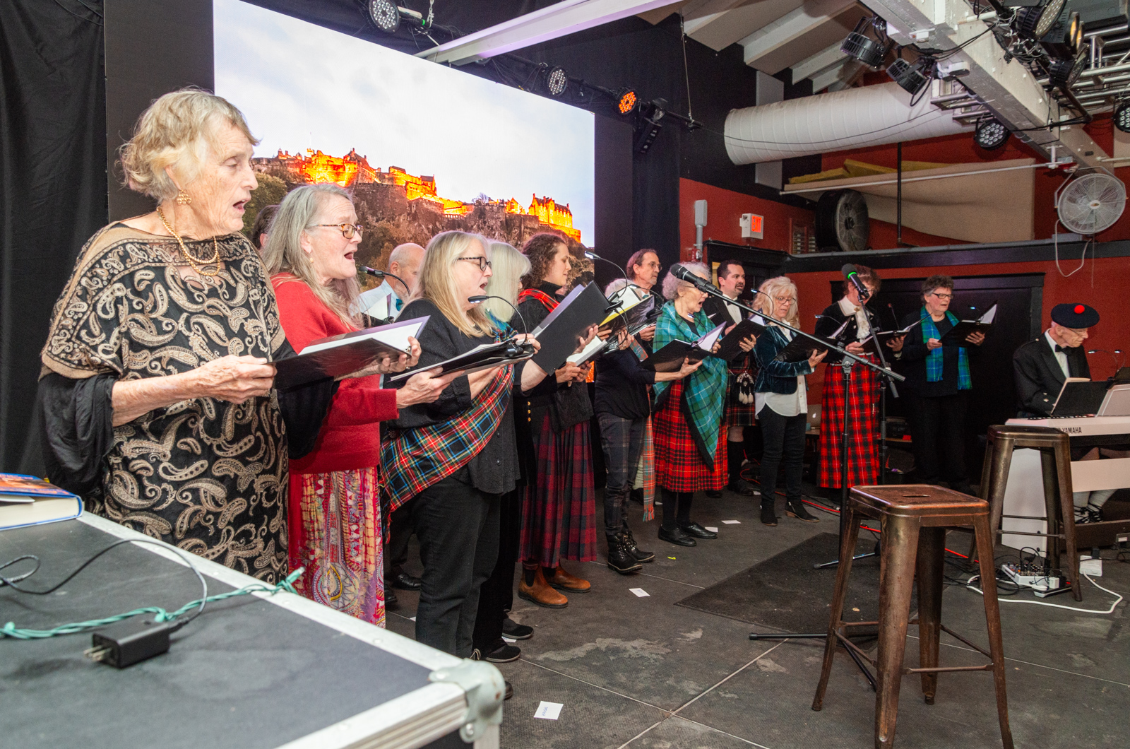 The Scottish Society Singers regale the audience with highland tunes.