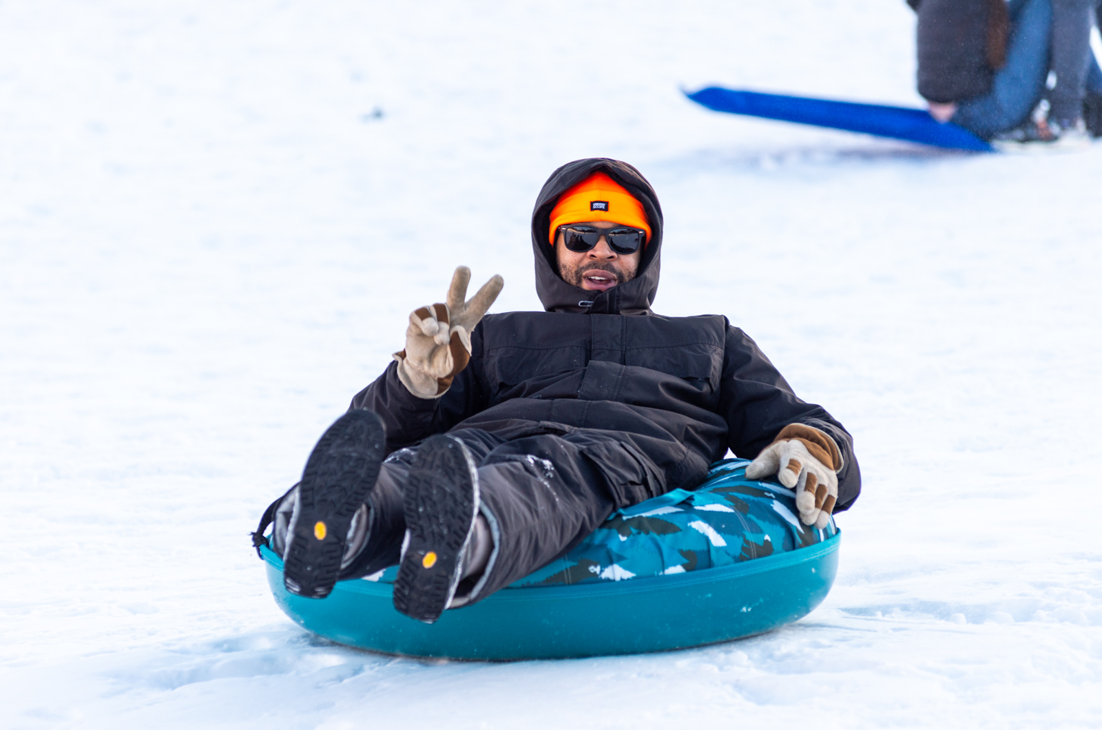 Grown-ups enjoyed the sledding as well.