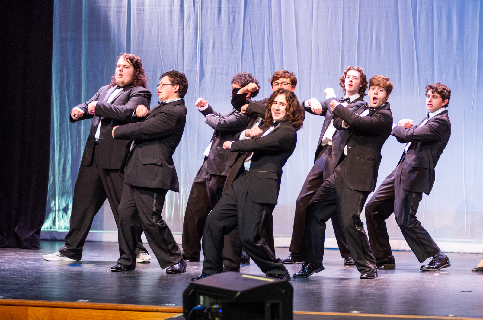 Tenors, Baritones, and Basses show off their dance moves.