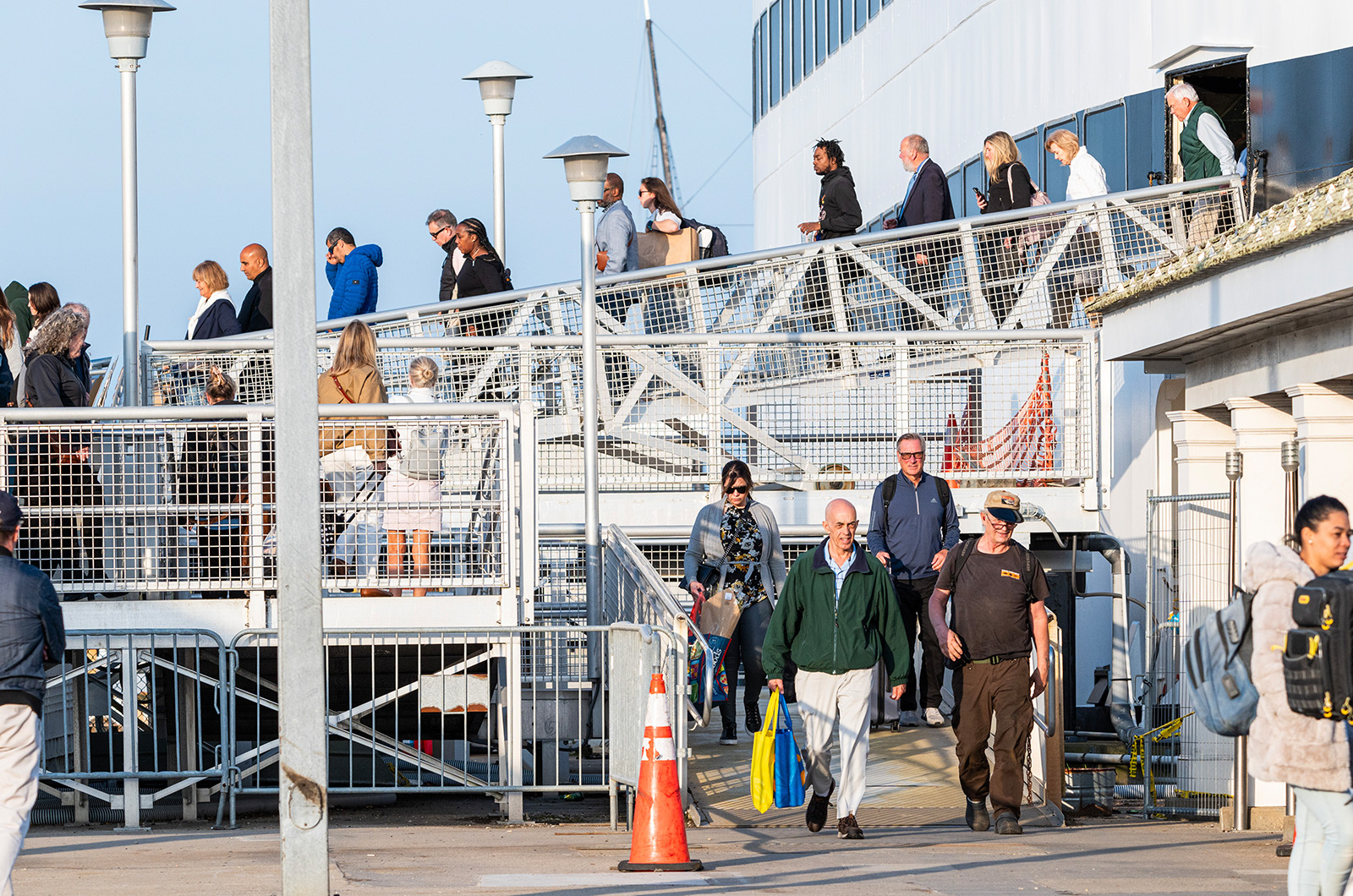 The ferry unloads its contents of passengers.
