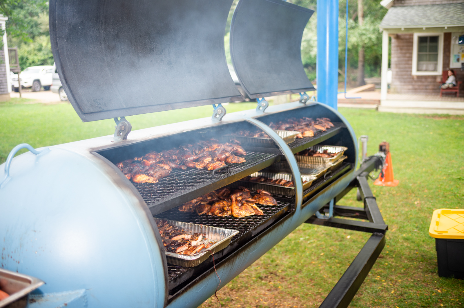Tyler Potter of The Swimming Pig making barbecue.