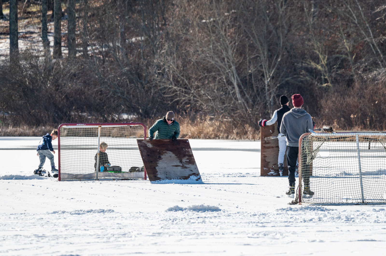 There is no Zamboni, but the rink still has to be cleared.