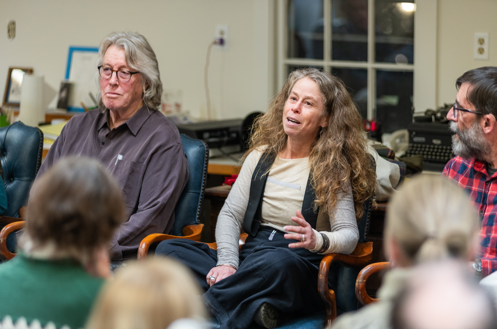 Suzan Bellincampi (middle) discusses her approach to the "All Outdoors" column.