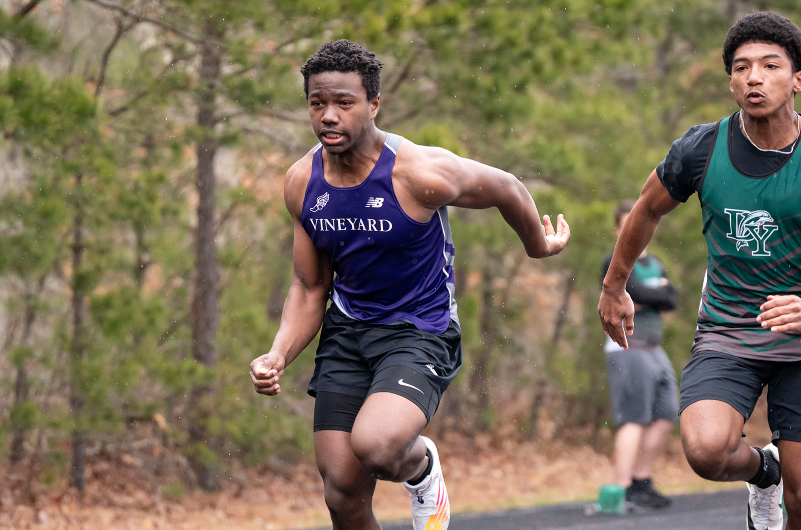 Vineyard athlete giving it his all against a Dennis-Yarmouth athlete.