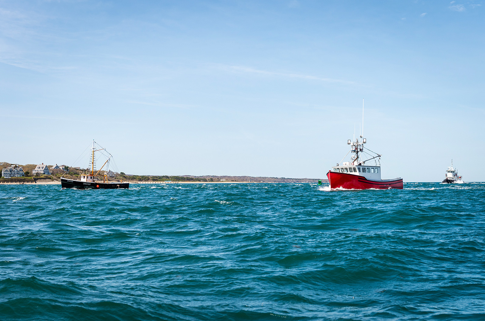 Little Lady with her escort vessels following.