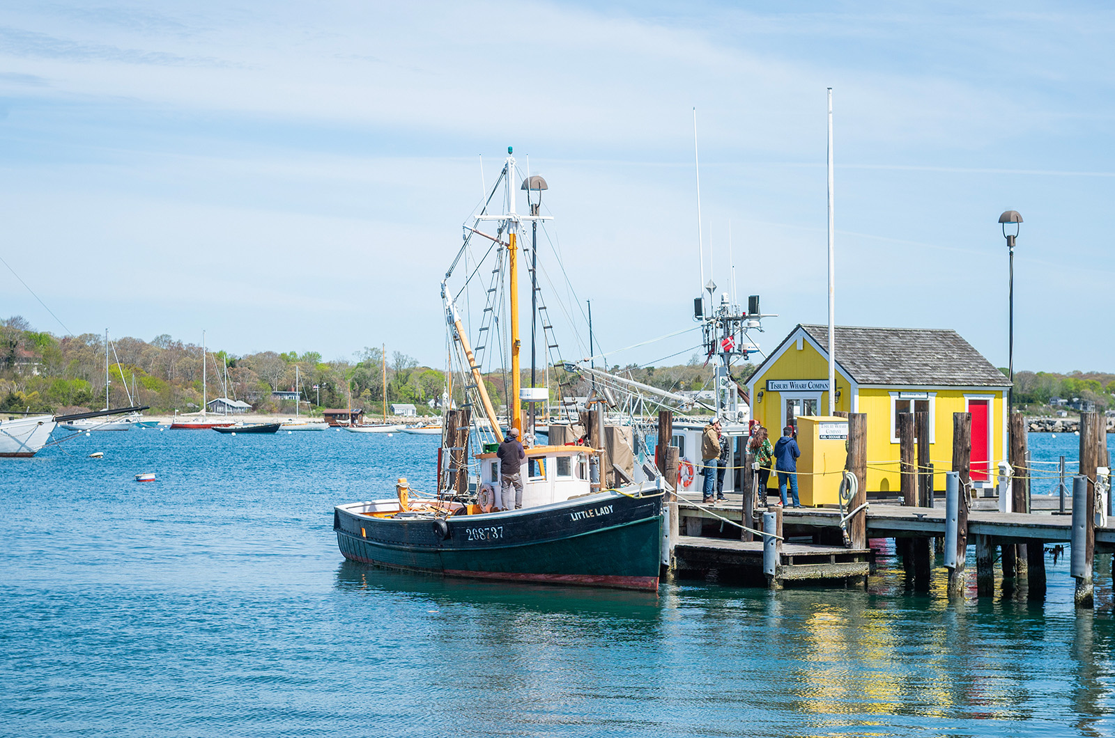 Little Lady tied up at the pier at the Tisbury Wharf Company.