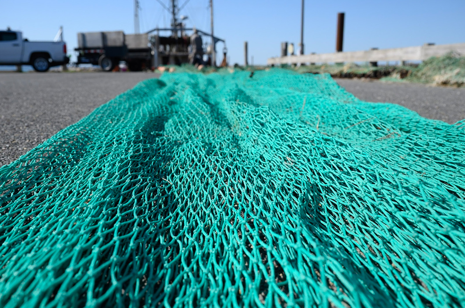 Laying the net out on the pier.