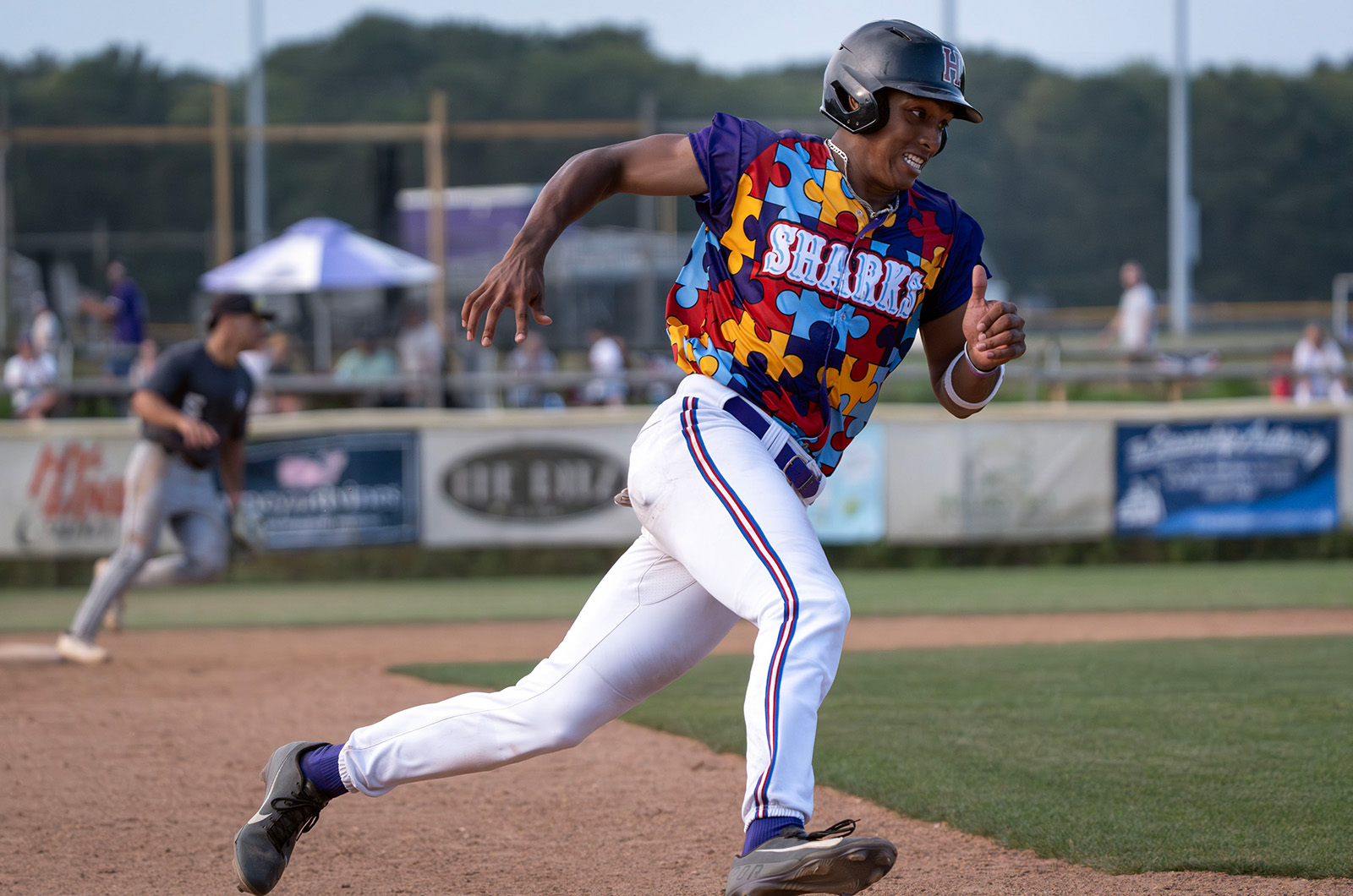 Running hard around the bases.