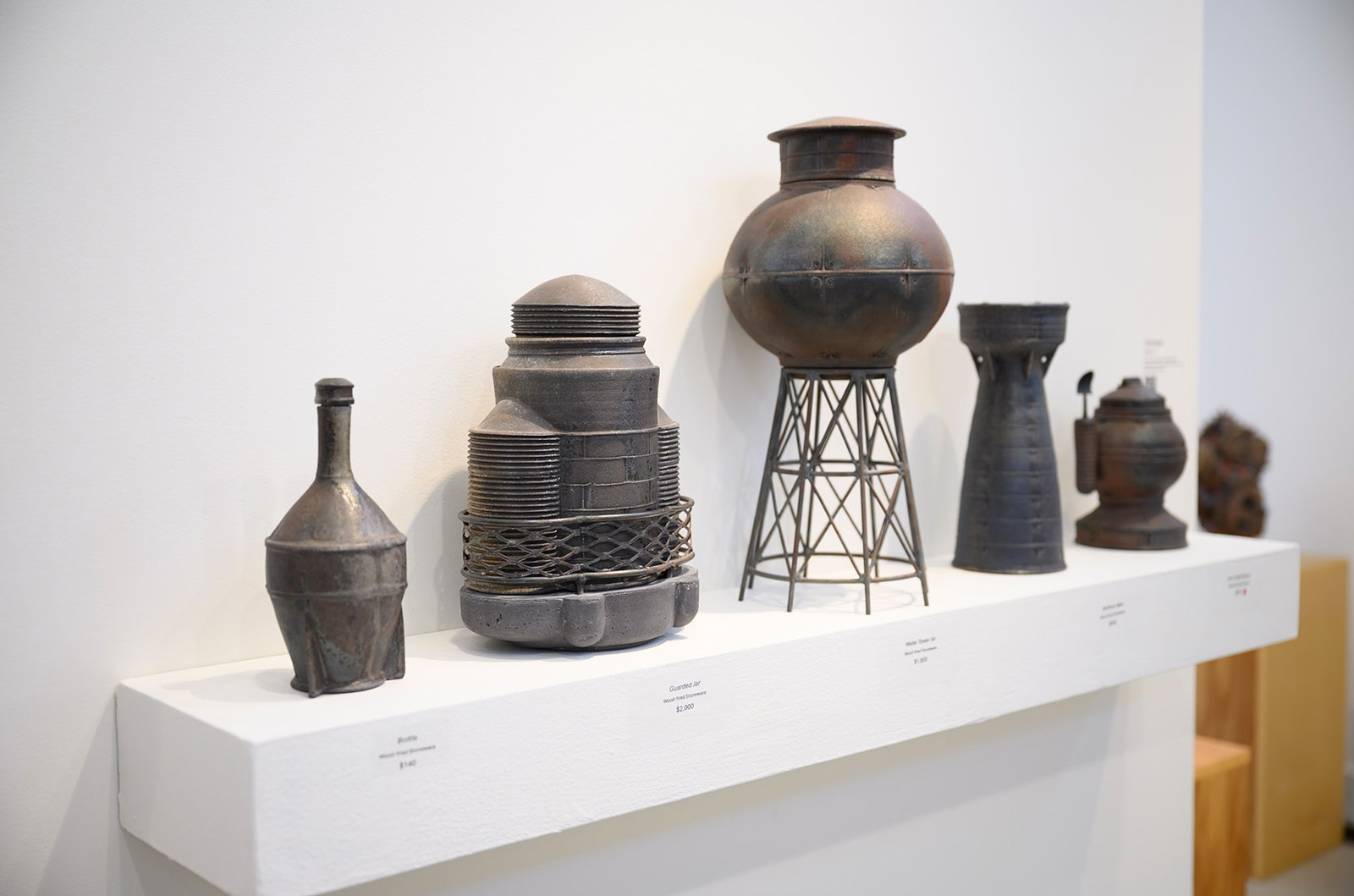 Industrial forms contrast the natural material.
