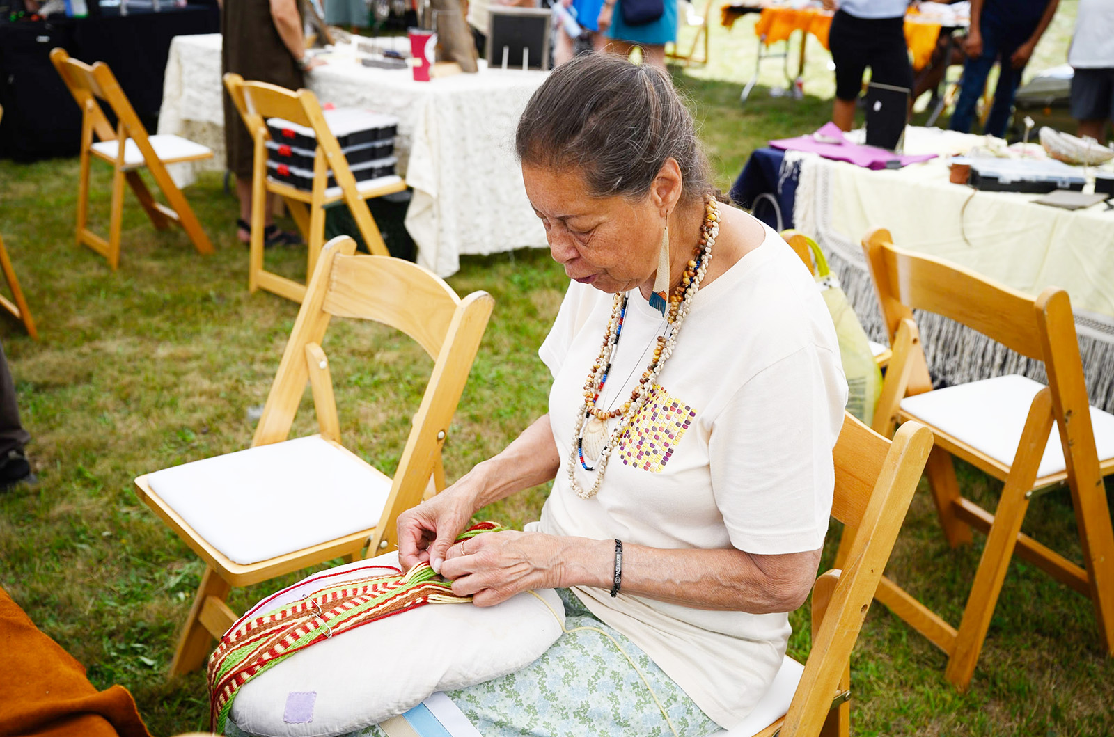 Marlene Lopez working on one of her weavings.