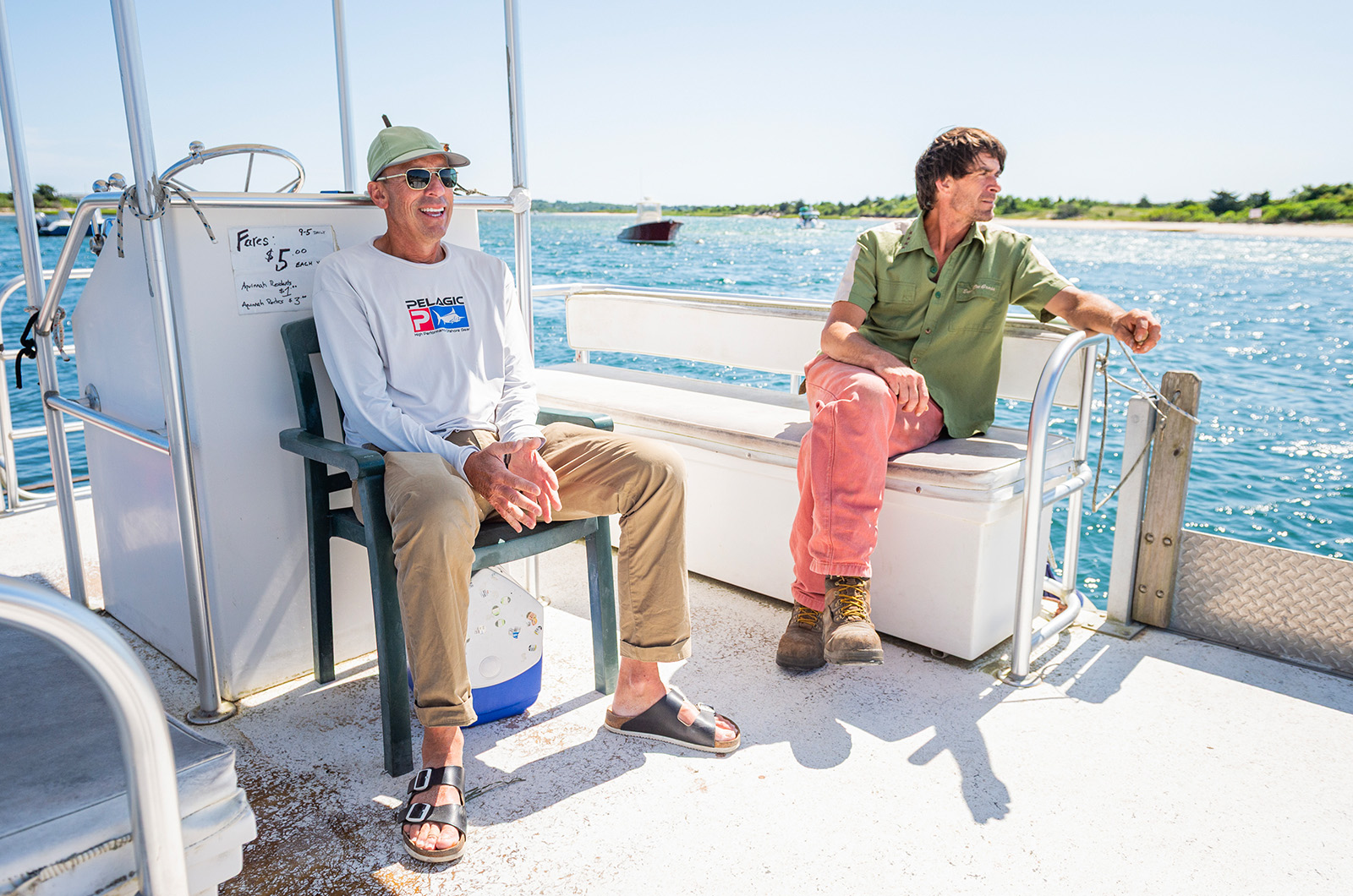 Sean McGowan (left) drives the ferry most days and Isaac Taylor (right) fills in.