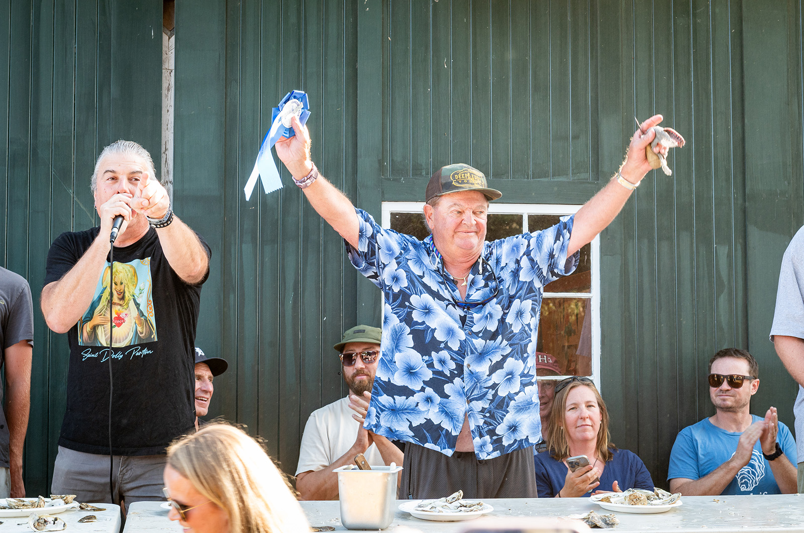 Captain Teddy Karalekas is once again crowned oyster shucking champion.