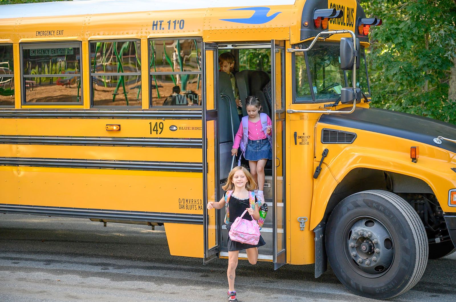 The first arrivals on the bus at the Oak Bluffs school.
