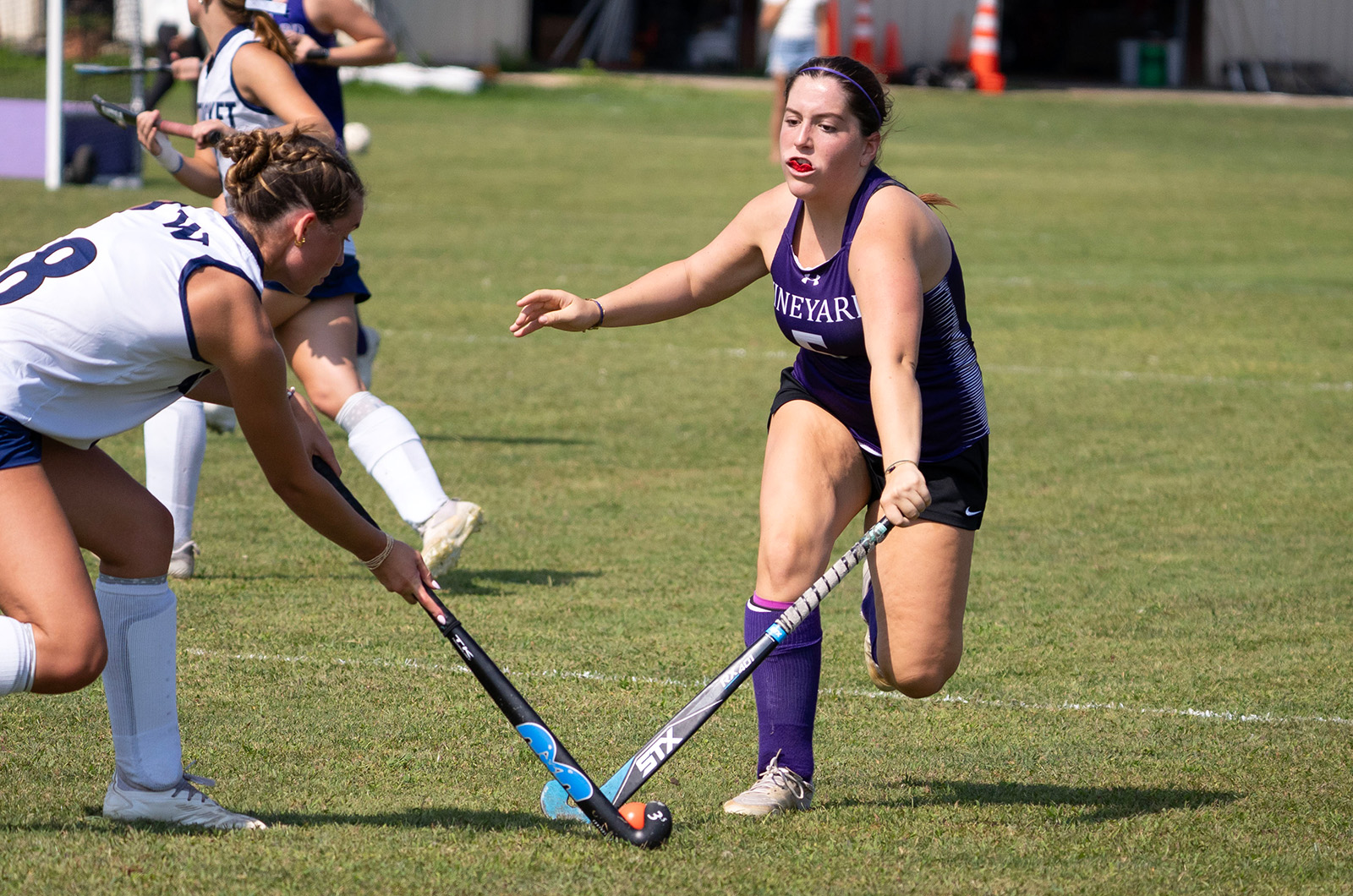 Isla Solon fights for it with Nantucket player.