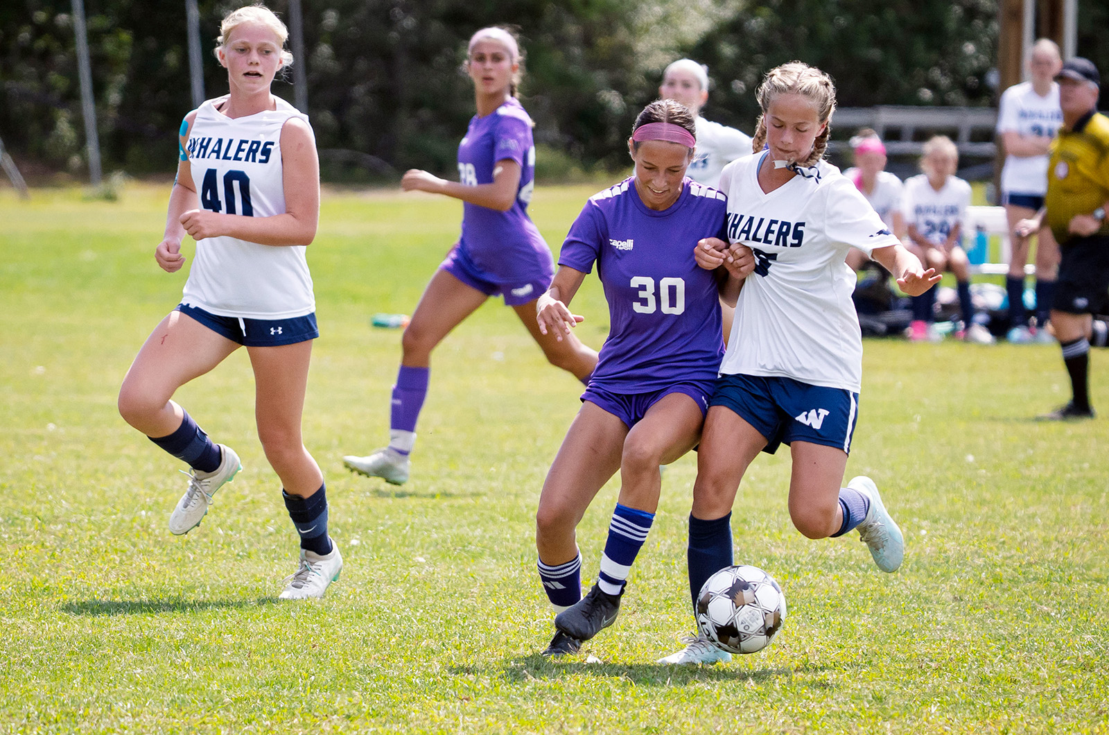 Elizabeth Carbon (center) battles it out.