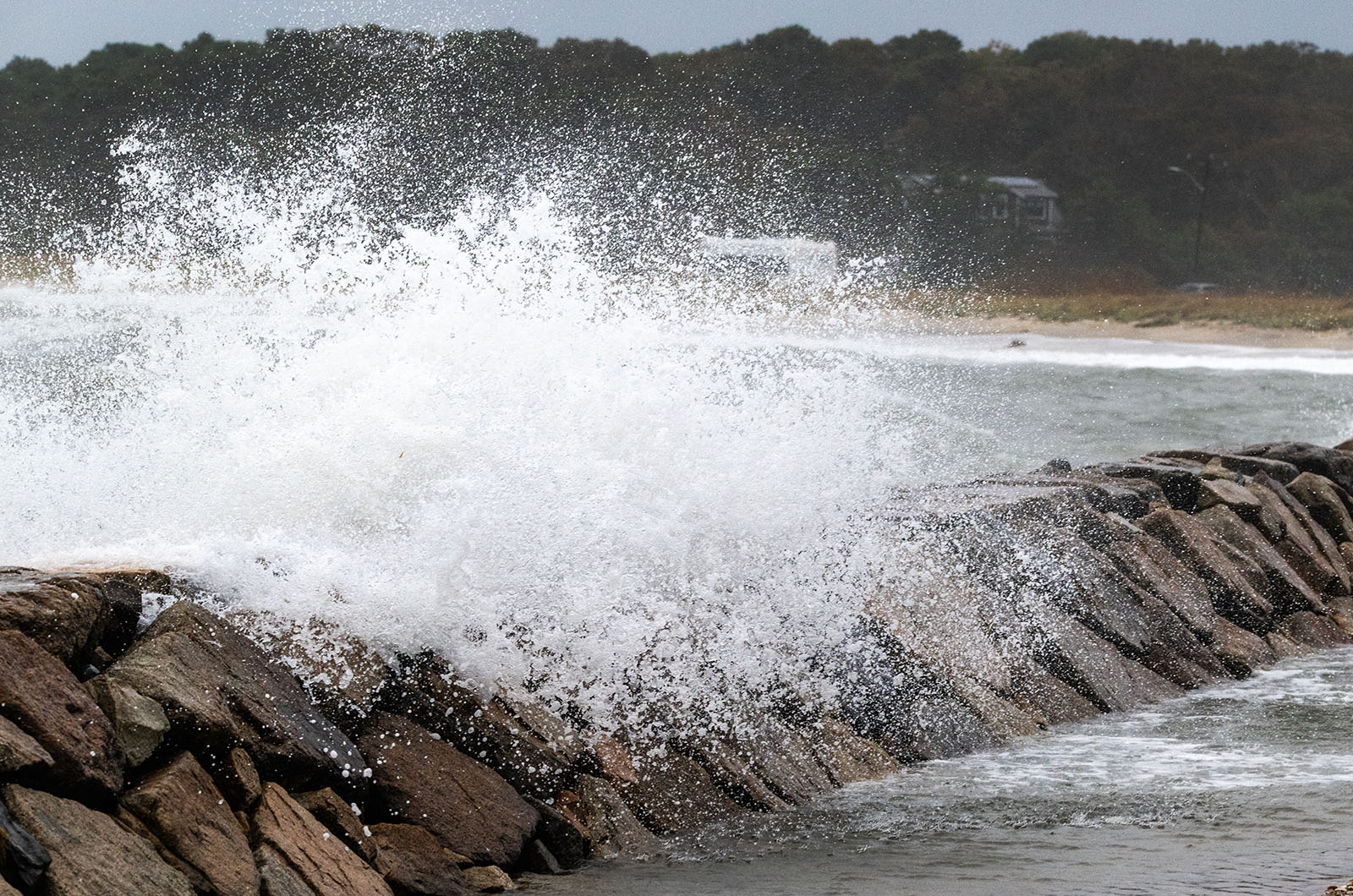 Waves and spray at the Oak Bluffs sea wall.