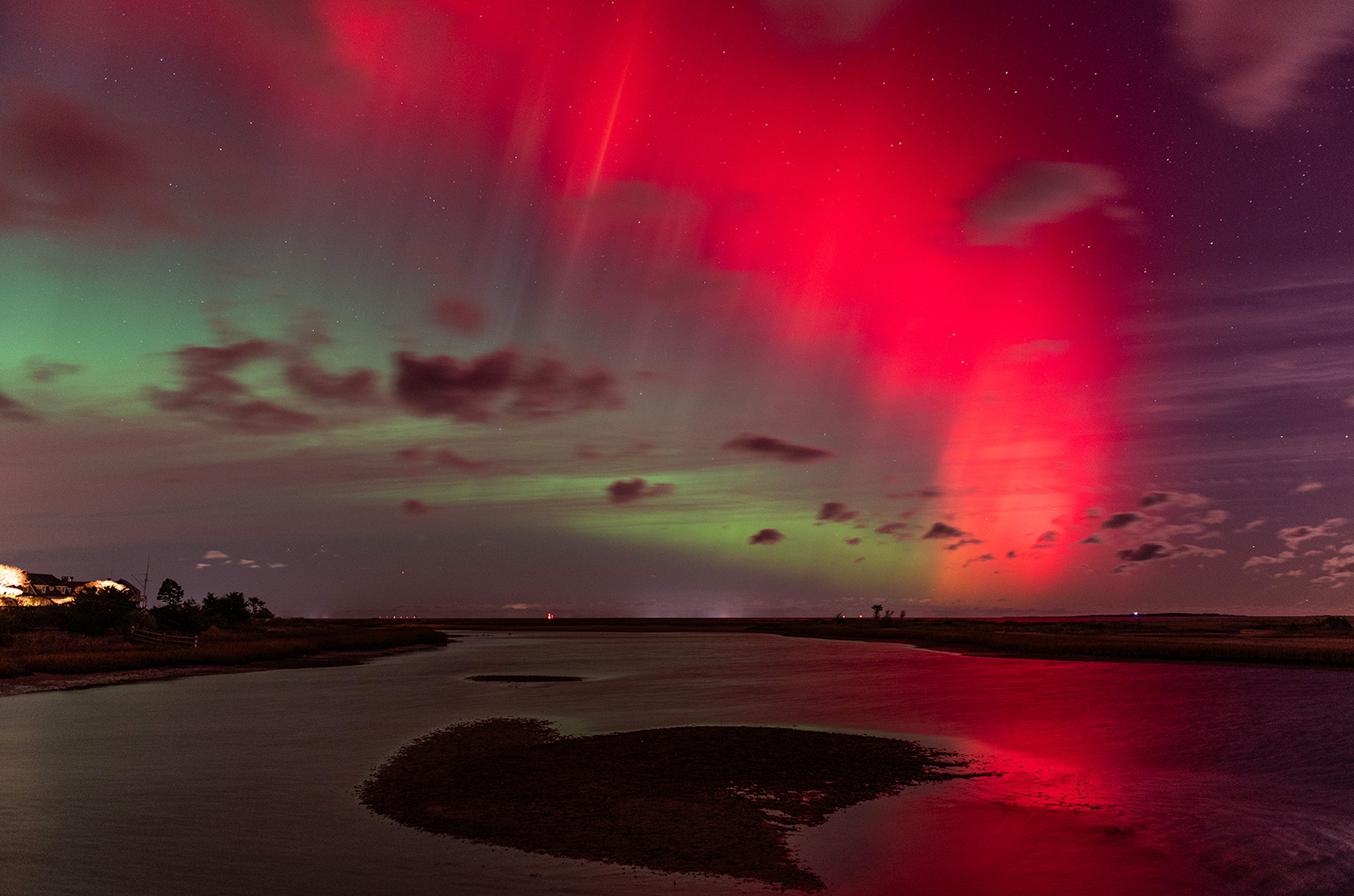 A saturated streak of red is seen over Lighthouse Beach in Edgartown.