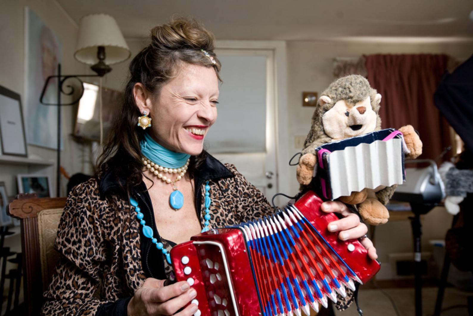 bella playing accordian