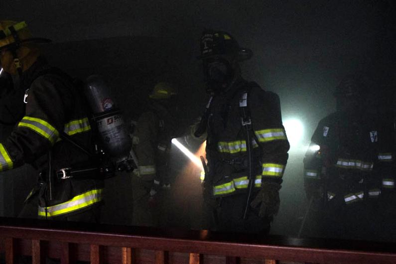 Inside is dark and smoke filled.