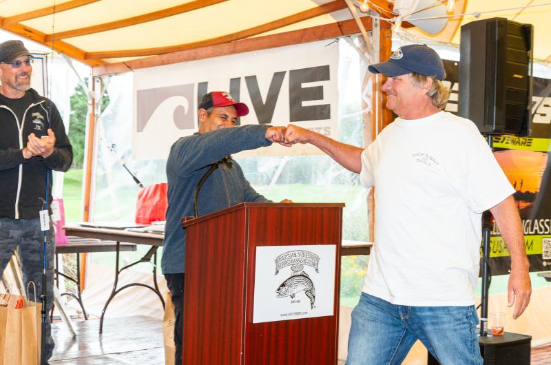 Joe El-Deiry fist-bumps Bill Potter.