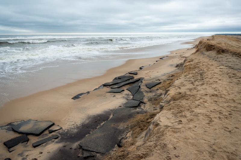 Old asphalt is revealed by new erosion at Right Fork.