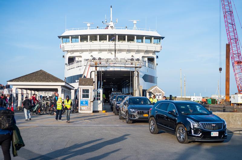 A line of cars exits the ferry in Vineyard Haven.