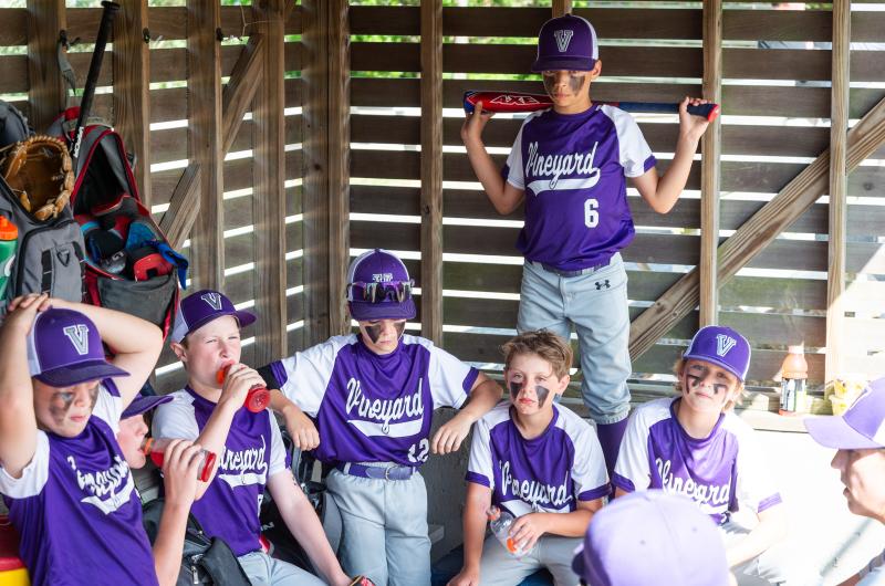 Little leaguers huddle up before the game.