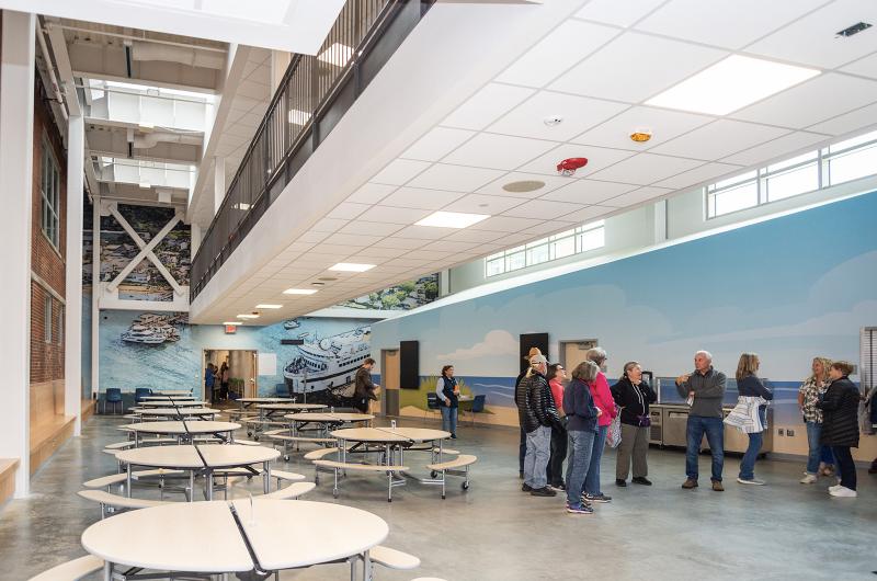 The walkway spans over the cafeteria.