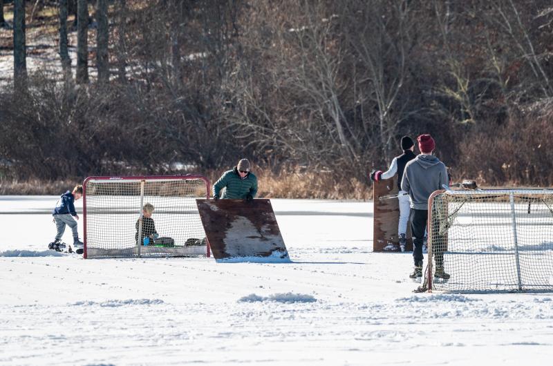 There is no Zamboni, but the rink still has to be cleared.