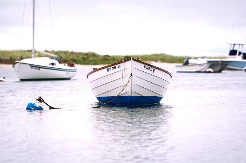 A dinghy awaits the next trip.