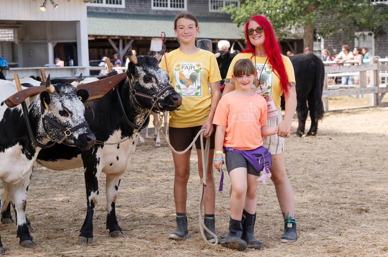 Wren Robertson, Regan Fisher, and Elizabeth Bonifacio of the 4H club were busy all fair.