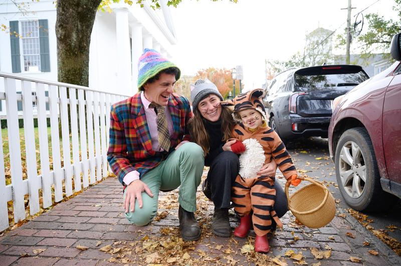 Ethan, Bri and daughter Rilo Buchanan-Valenti are getting in the spirit near the Old Whaling church.