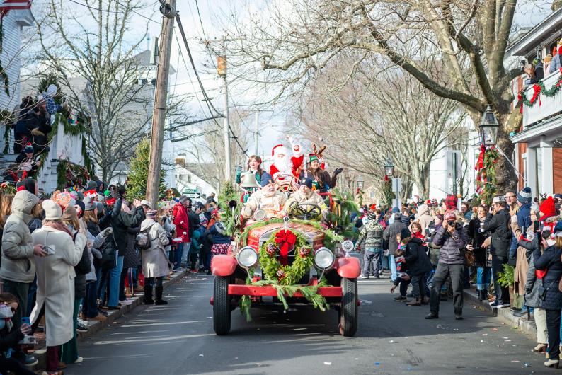 Santa makes his way down Main street.