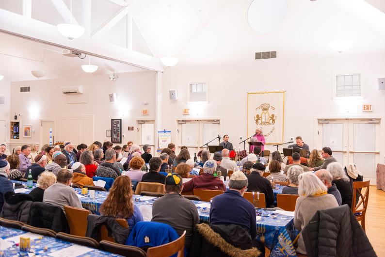 Music and prayer filled the hall on Sunday.