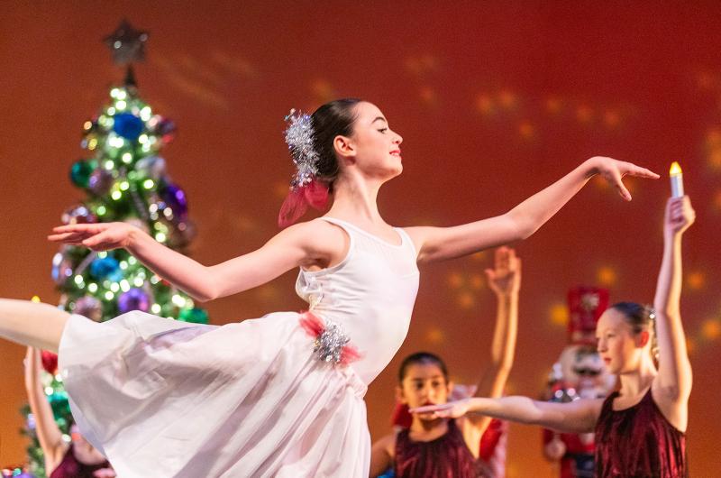 Ballet dancers spread holiday spirit.