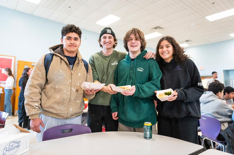 Raphael Aviles, Hunter Bolduck, Brady Vougt and Heidi Turner are happy customers.