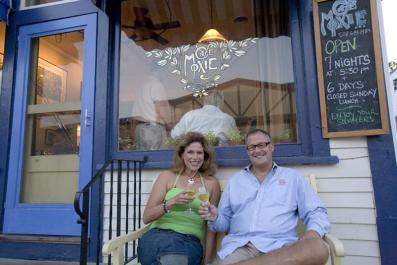 Virginia Alfaro and Capt. Bob Balewicz in front of Cafe Moxie