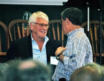men talking Greg Craig