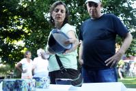 couple looks at pottery
