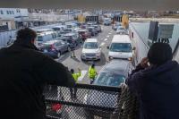Freight boat Sankaty fills up quickly with cars.