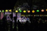 While strollers looked at the evening's lit cottages, the band played on.