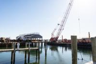 Crane barge has been stationed at the wharf all winter. The contractor is BTT Marine of Boston.