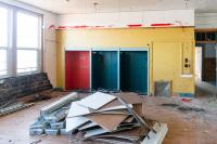 Various materials are stripped and organized before the real demolition begins on the second floor.