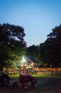 The moon rises over the fair.